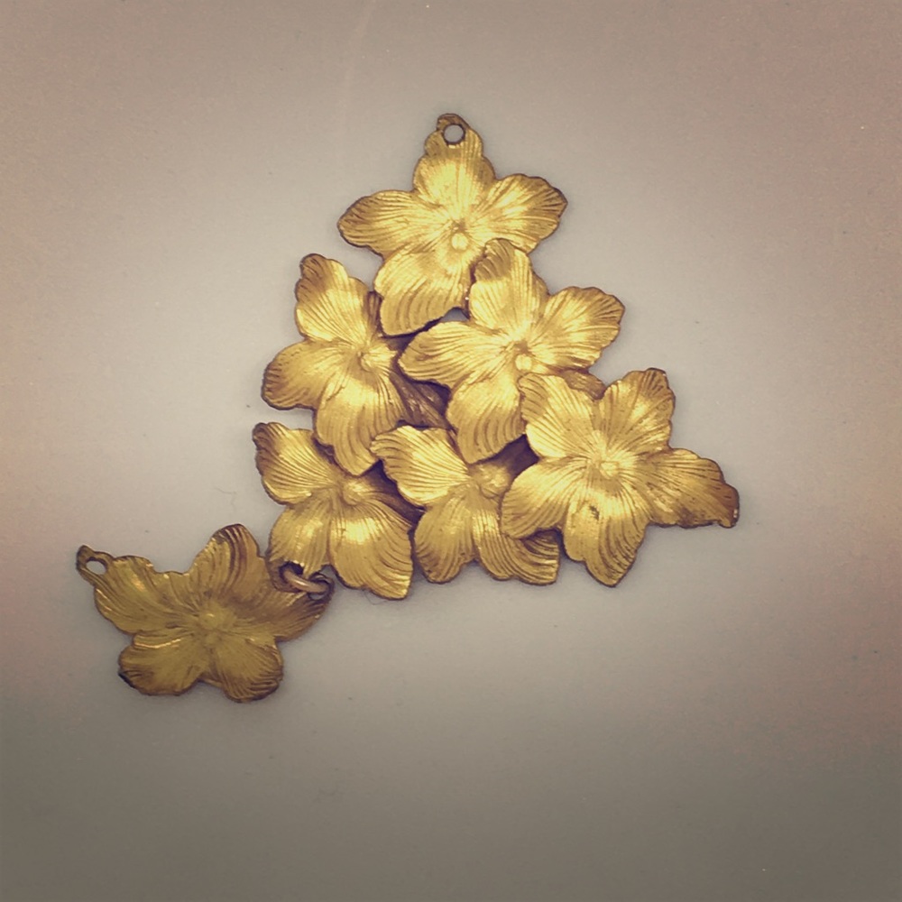 Piece of delicate gold Vintage hammered flowers
